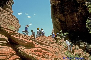 Group of hikers resting in the Gunsight notch.