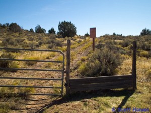 Trailhead offers two initial routes including this stepover to a two-track road