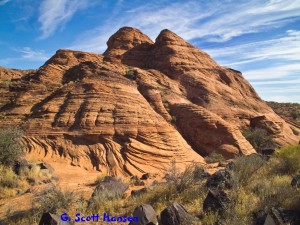 Massive red rock formation lies ahead of the start of the loop