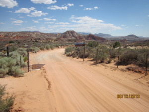 The road intersects the north boundary of the Red Cliffs Desert Reserve/NCA at this signed location and continues for 3 1/2 miles to its southern end at the Virgin River.