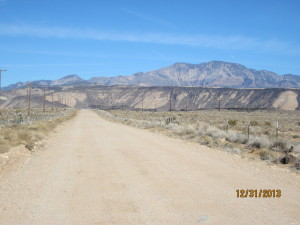 The final 5.4 miles of the road consist of graded dirt maintained by county road crews.  The road can be rough and rocky, particularly after rains.